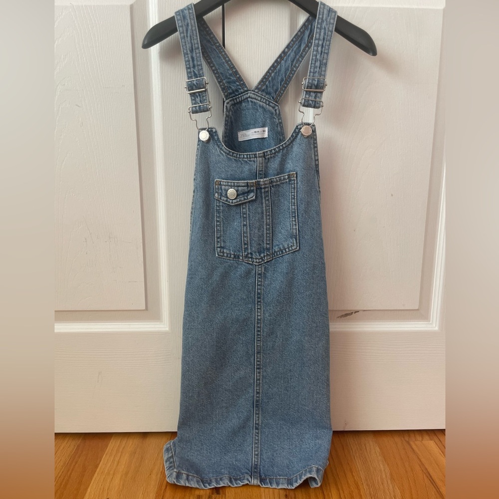 Blue jean overalls for girls 13-14. Not the shorts structure but a dress/ skirt.